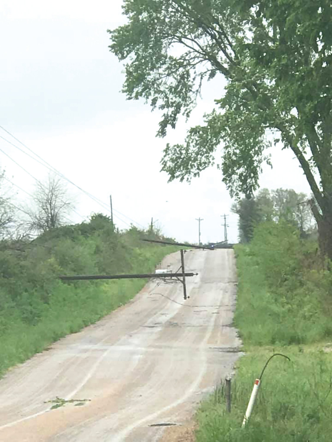 Several downed power lines lay onto the road at Wheeler Arch Road. Lines were also down on Top Road.